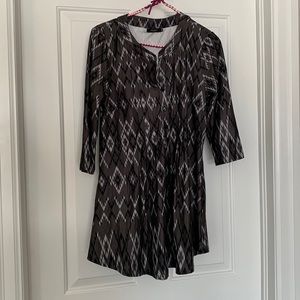 Reborn tunic with pleated details at the top and a flattering flowy bottom